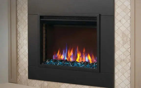 Napoleon electric fireplace set into a tiled feature wall