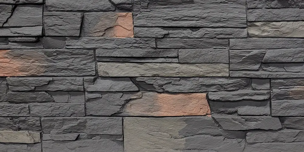 Close detail of stacked ledge stone veneer in grey