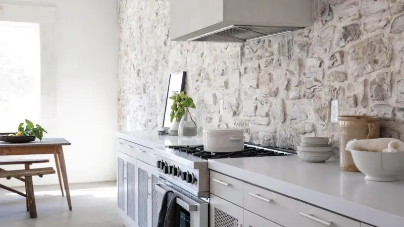 Kitchen with a Hillstone Lucera stone backsplash wall
