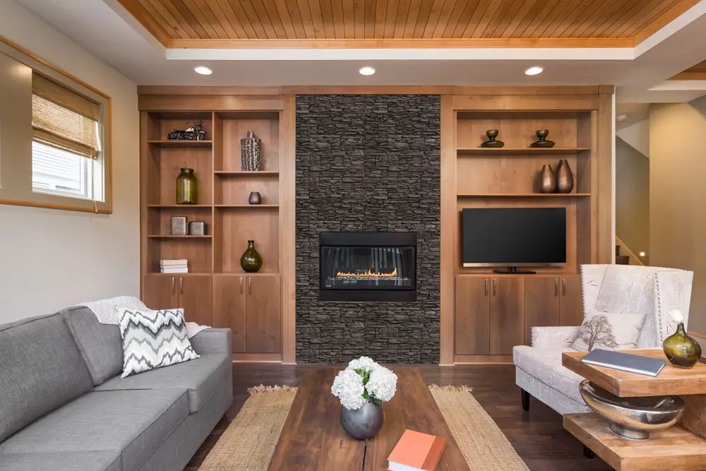 Interior fireplace clad in Cordillera natural stone in Lava