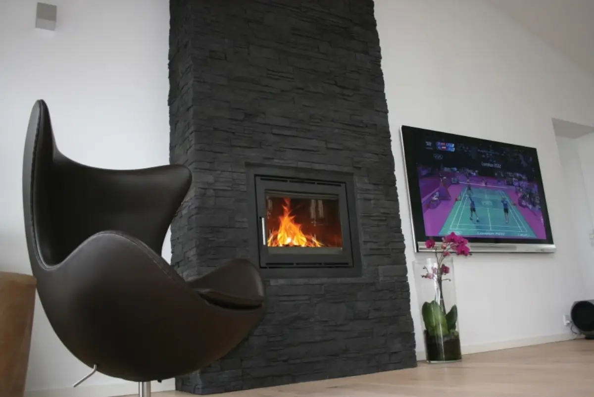 Fireplace surround in Sierra natural stone, Black